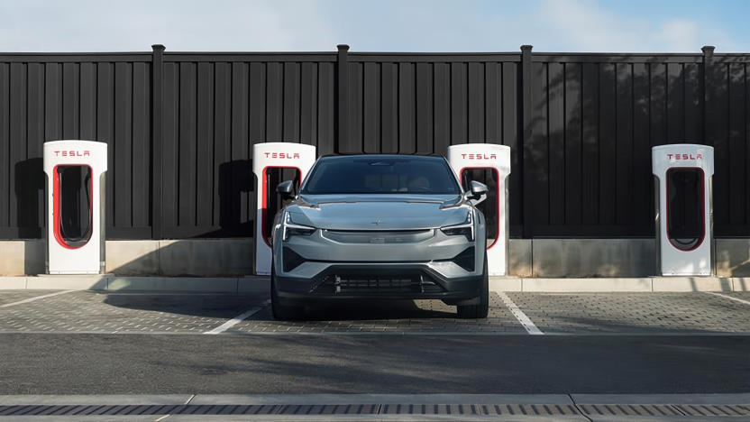 A Polestar 3 charging at a Tesla Supercharger station.