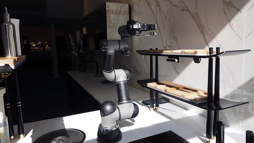 Image of the Moley Robotics X-AiR kitchen robot while cooking.
