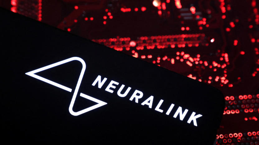 A smartphone with a Neuralink logo displayed is placed on a computer motherboard in this illustration taken on May 15, 2024. REUTERS/Dado Ruvic/Illustration